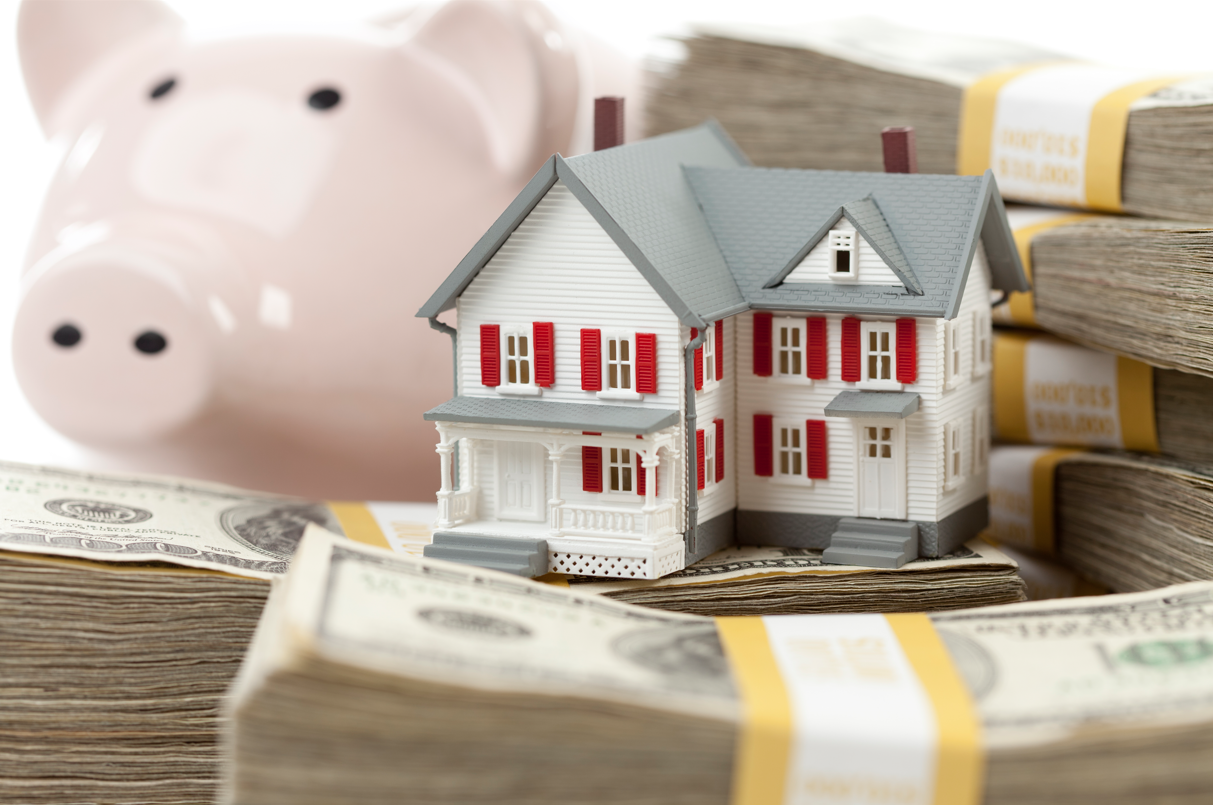 What Is Home Equity Financing - Small House and Piggy Bank with Stacks Money